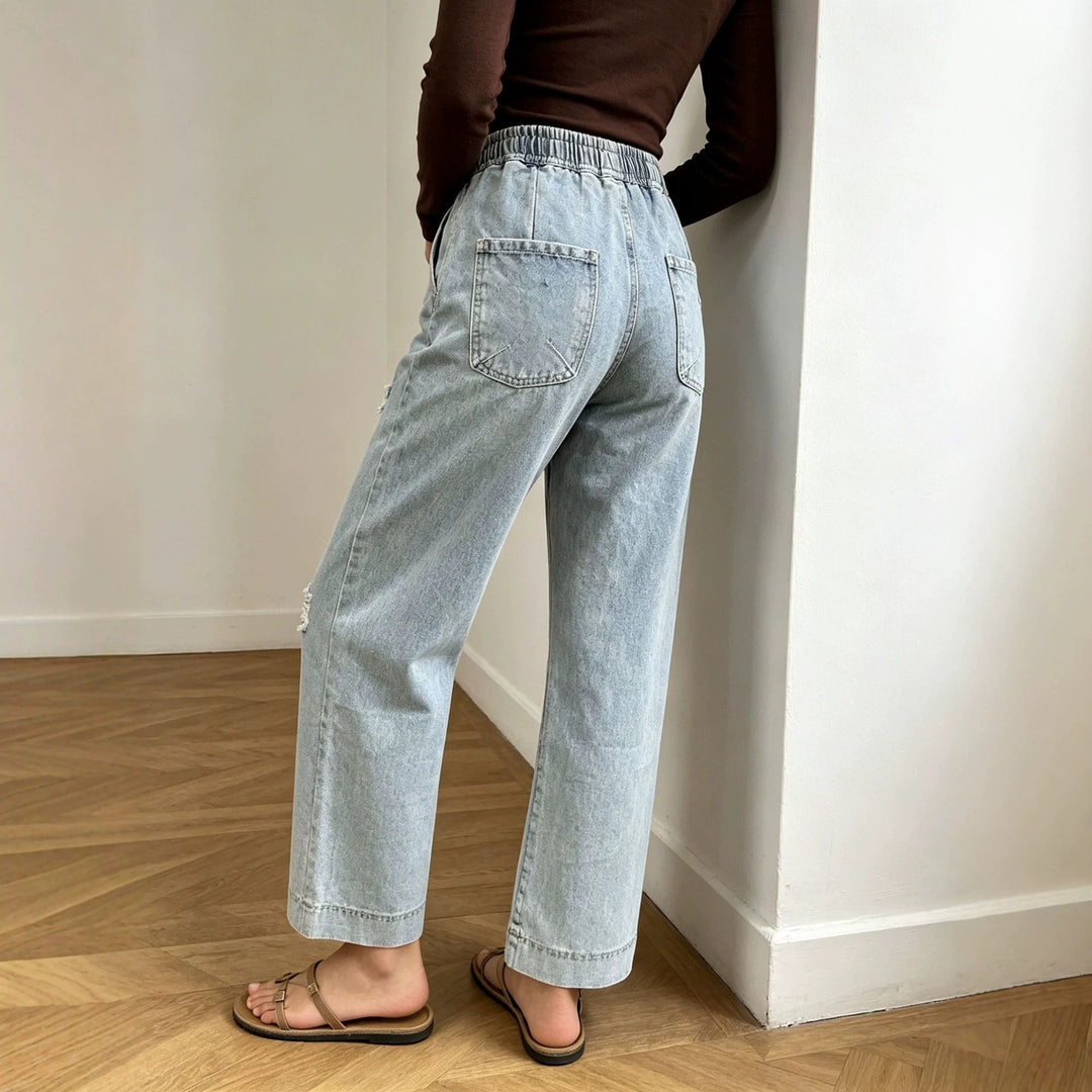 Women's wide denim pants with elastic drawstring waistband, used effects and relaxed fit Mune Fashion