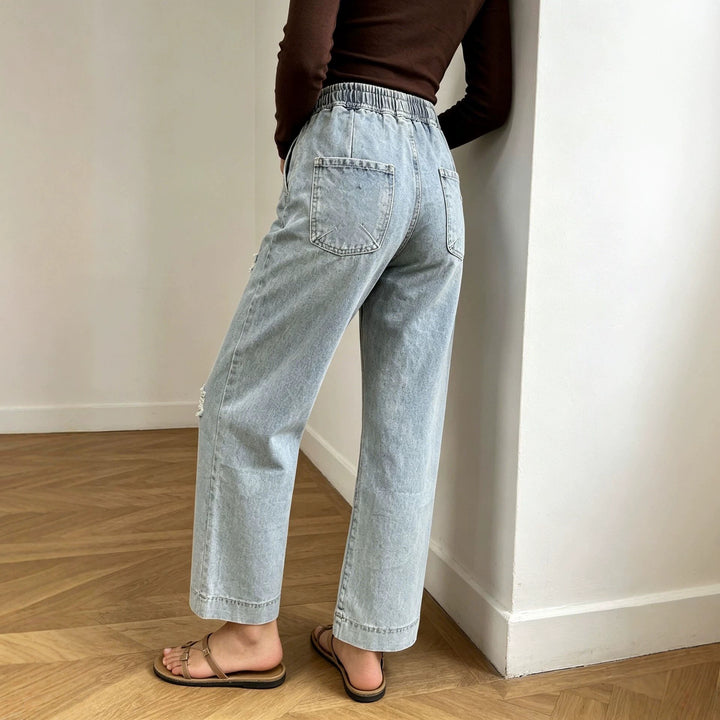 Women's wide denim pants with elastic drawstring waistband, used effects and relaxed fit Mune Fashion