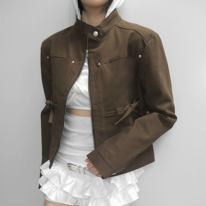 Women tailored short jacket with stand-up collar, epaulettes, waist belts and continuous zipper Mune Fashion