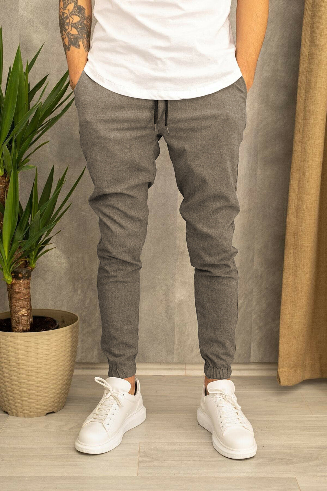 Men's slim fit jogging pants with elastic waistband, drawstring, and ribbed ankle cuff Mune Fashion