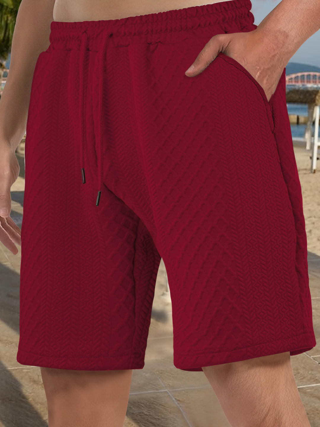 Men's textured beach bermuda shorts made of waffle jersey with elastic drawstring waistband and slanted pockets Mune Fashion