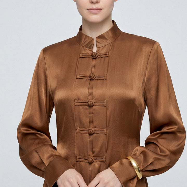 Women’s maxi dress with stand-up collar, traditional knot closure, and balloon sleeves Mune Fashion