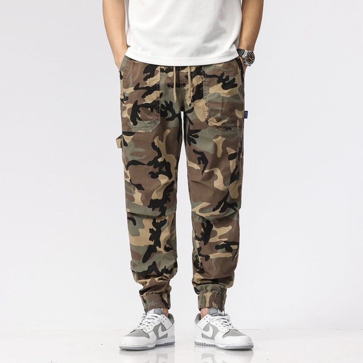 Herren Camouflage-Cargo-Joggerhose mit Tunnelzug, Mehrfachtaschen und gerippten Beinabschlüssen Mune Fashion