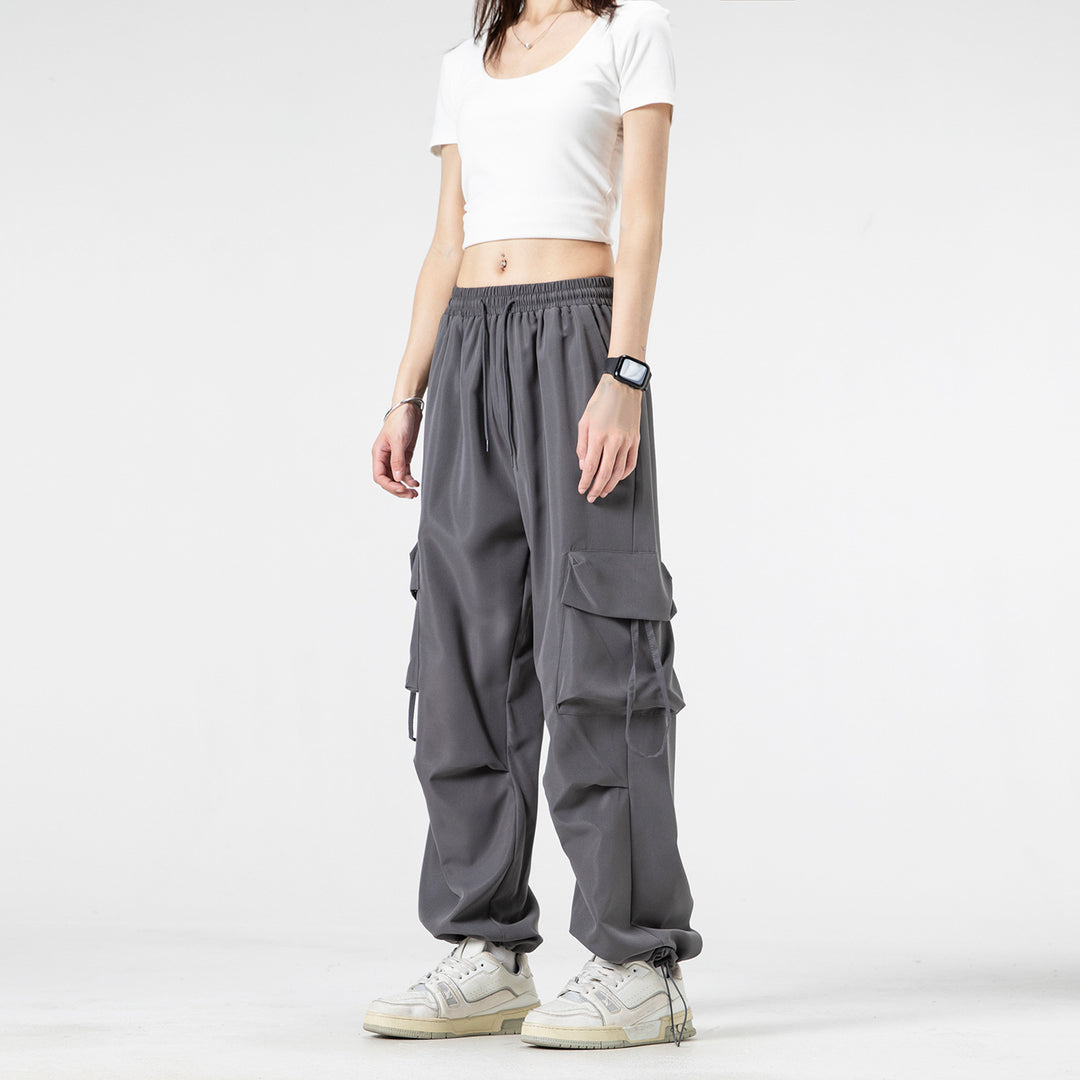 Unisex Wide Cargo Pants in Baggy Cut with Drawstring Waistband, Multiple Flaps, and Adjustable Leg Closures Drune