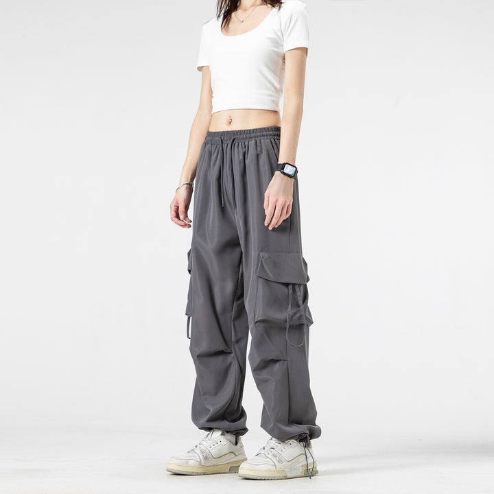 Unisex Wide Cargo Pants in Baggy Cut with Drawstring Waistband, Multiple Flaps, and Adjustable Leg Closures Drune
