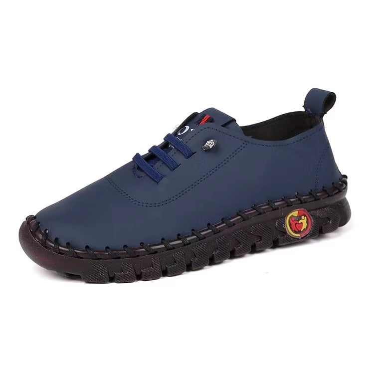 Women's hand-sewn moccasin loafers with elastic lacing, padded comfort insole, and patterned rubber sole Mune Fashion