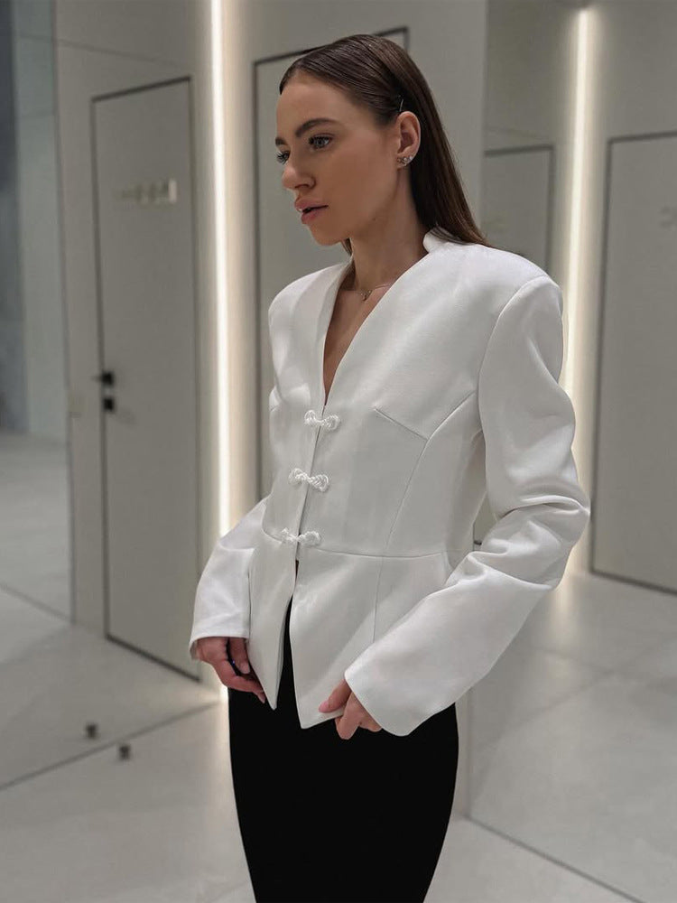 Women's peplum blazer with mandarin-like neckline and decorative knot fastenings Mune Fashion