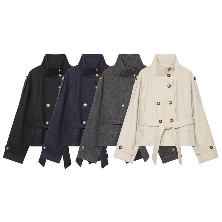 Women's short jacket in boxy cut with high standing collar, waist belt and decorative button placket Mune Fashion