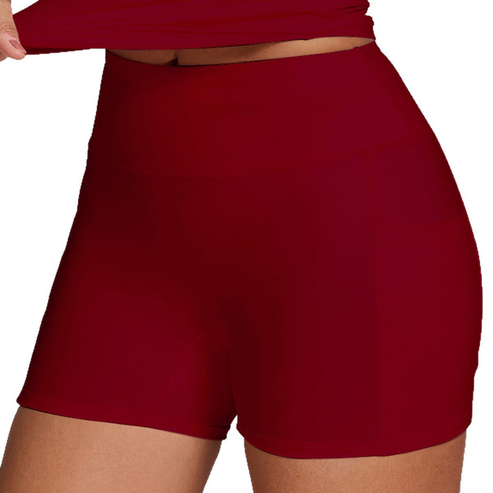 Women’s sporty compression shorts with practical side pockets Mune Fashion