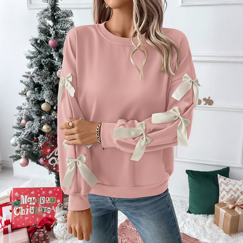 Women's sweatshirt with decorative bows on the sleeves Mune Fashion