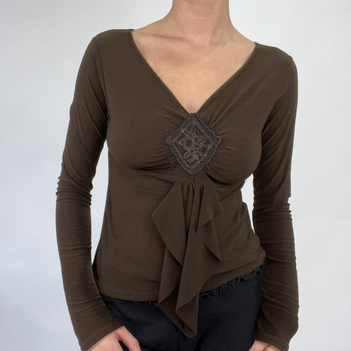 Women's Figure-Hugging V-Neck Long Sleeve Top with Decorative Crochet Application and Waterfall Hem Mune Fashion