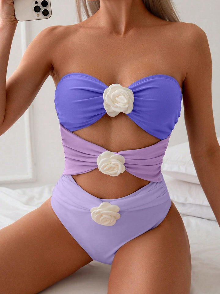 Women's bandeau swimsuit with elegant ruffles and floral accents Mune Fashion