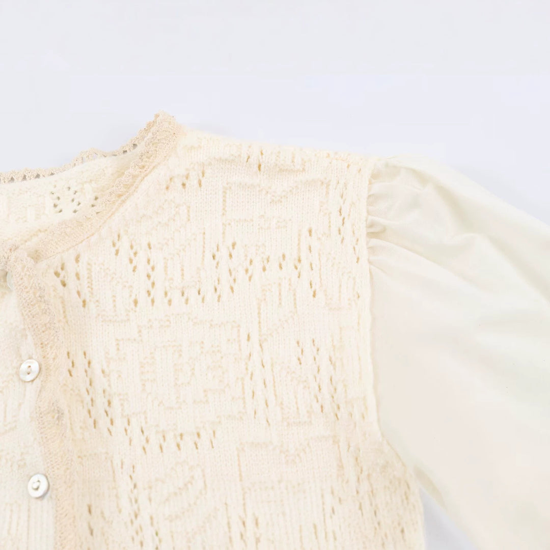 Ladies crochet blouse with lace sleeves, ruffle hem and button placket Mune Fashion