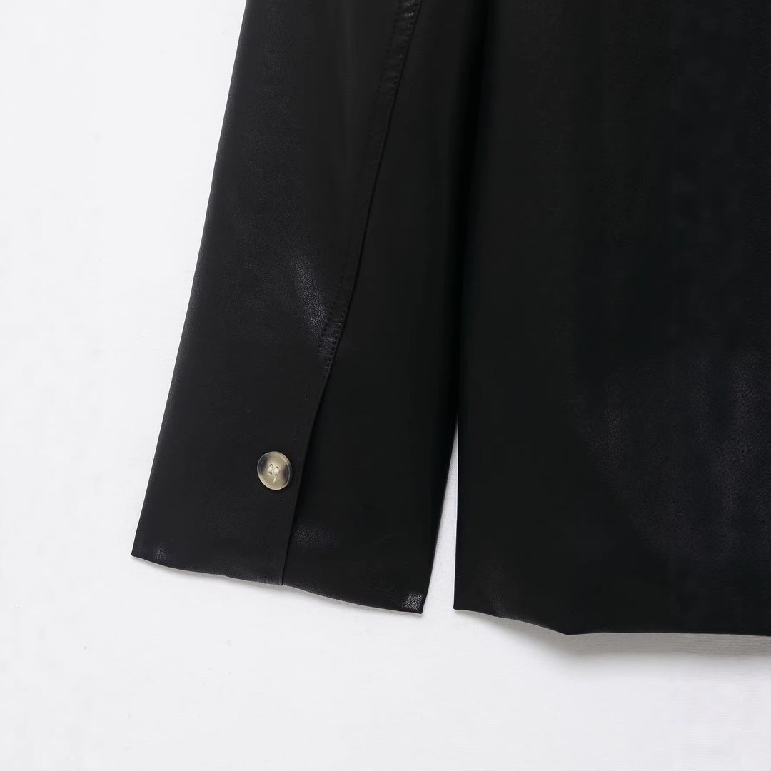 Women's A-line coat in vegan smooth leather look with shirt collar and continuous button placket Mune Fashion
