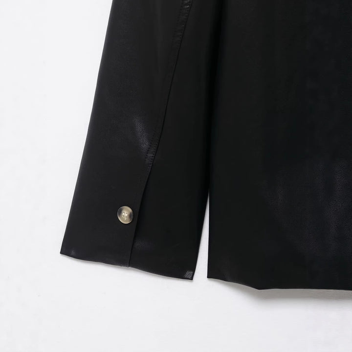 Women's A-line coat in vegan smooth leather look with shirt collar and continuous button placket Mune Fashion