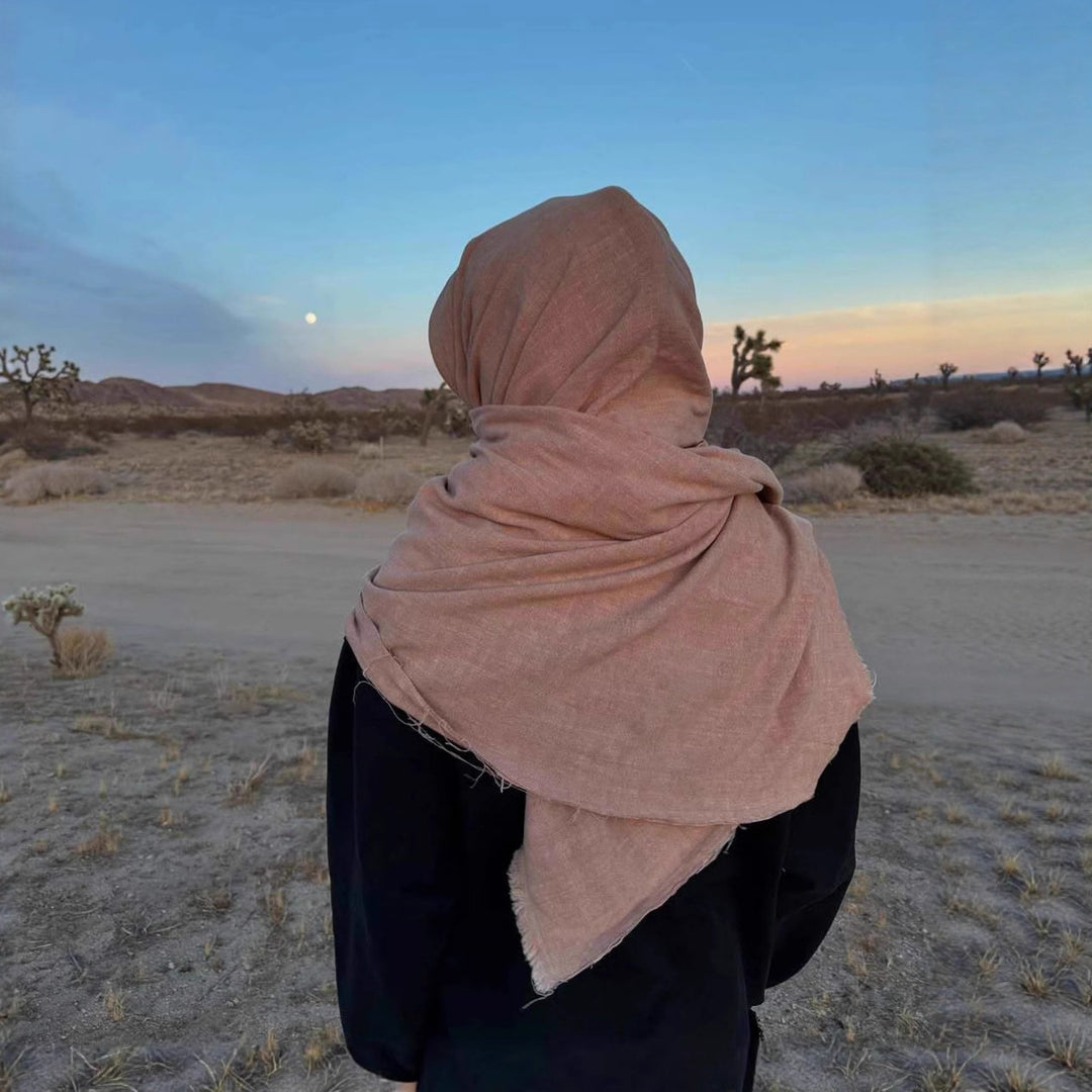 Unisex hooded pullover in usage marks style with attached tube scarf and frayed openings Mune Fashion