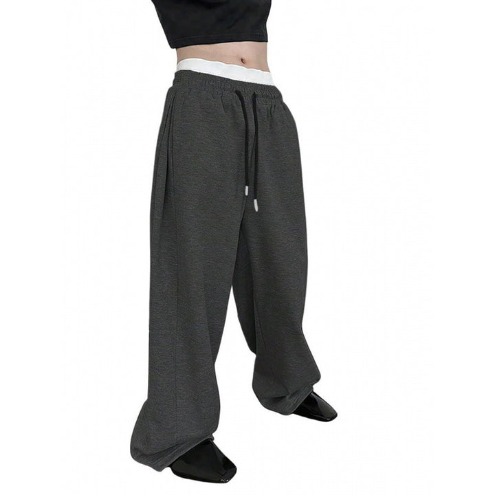 Women's wide oversize jogging pants with a deep crotch, elastic waistband, and drawstring Mune Fashion