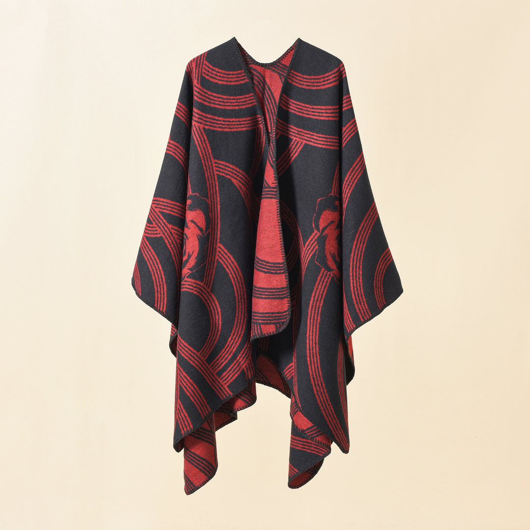 Ladies' collarless jacquard cape in a boxy oversized style with abstract medallion pattern