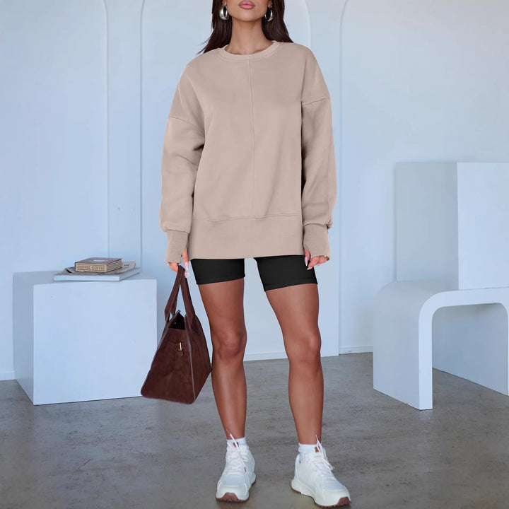 Women's Oversize Sweatshirt with Center Seam, Extended Hem, and Ribbed Cuffs Mune Fashion