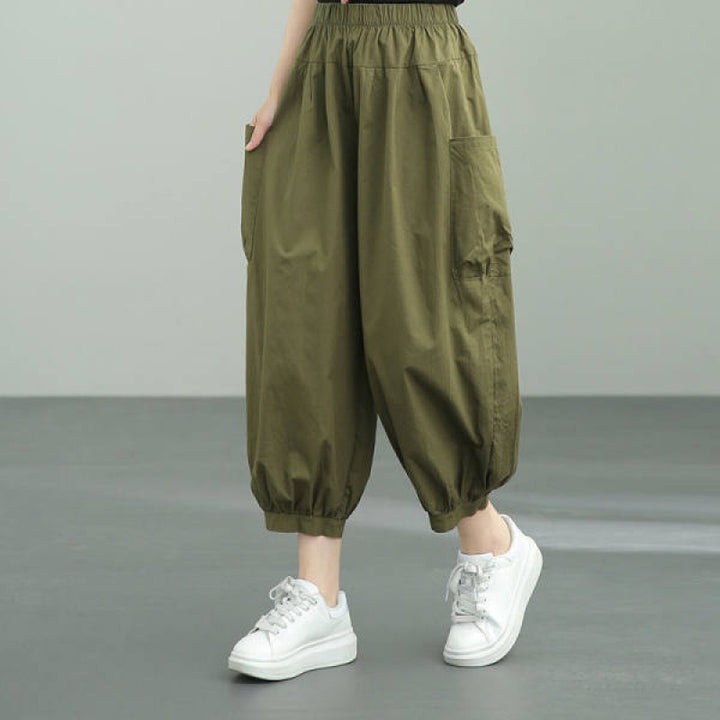 Women's wide harem pants with elastic waistband and applied side pockets Mune Fashion