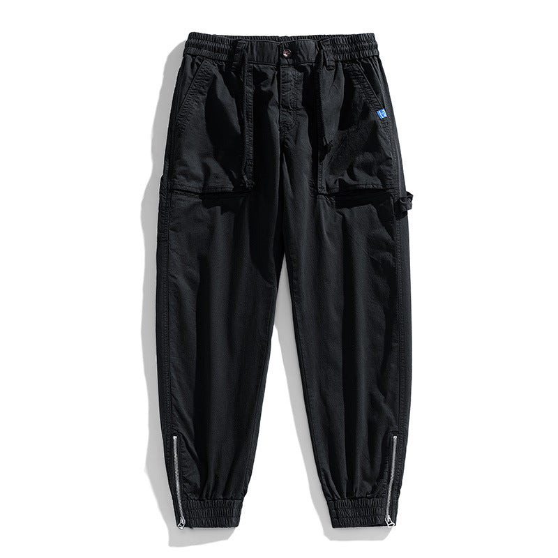 Men's workwear cargo pants in tech jogger style with applied front pockets, hammer loop, and ankle zippers Drune