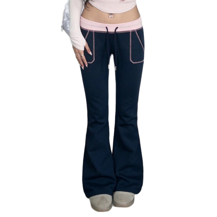 Women nan flared sweatpants with high waistband, drawstring, and contrasting decorative seams Mune Fashion