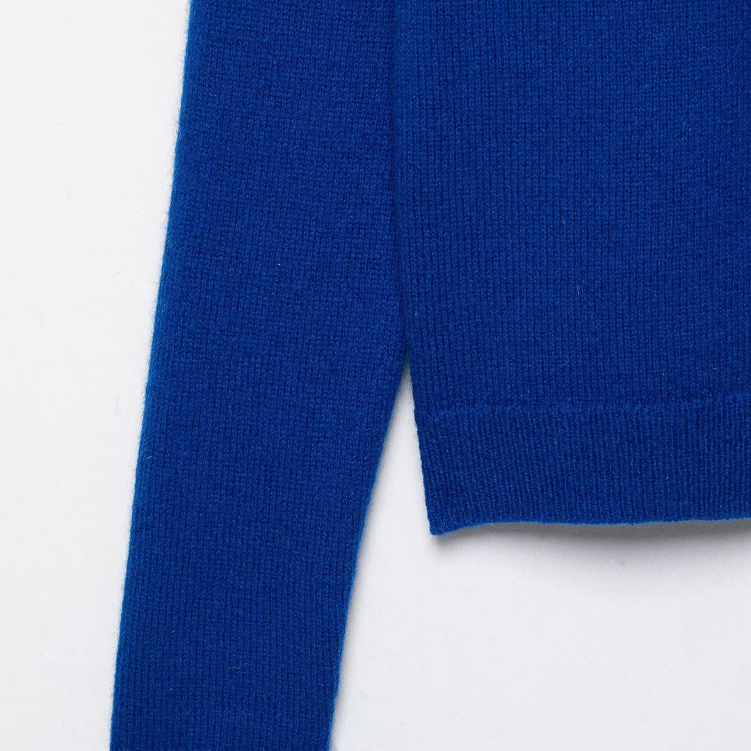 Women's fine knit cardigan with crew neck and continuous button placket Mune Fashion