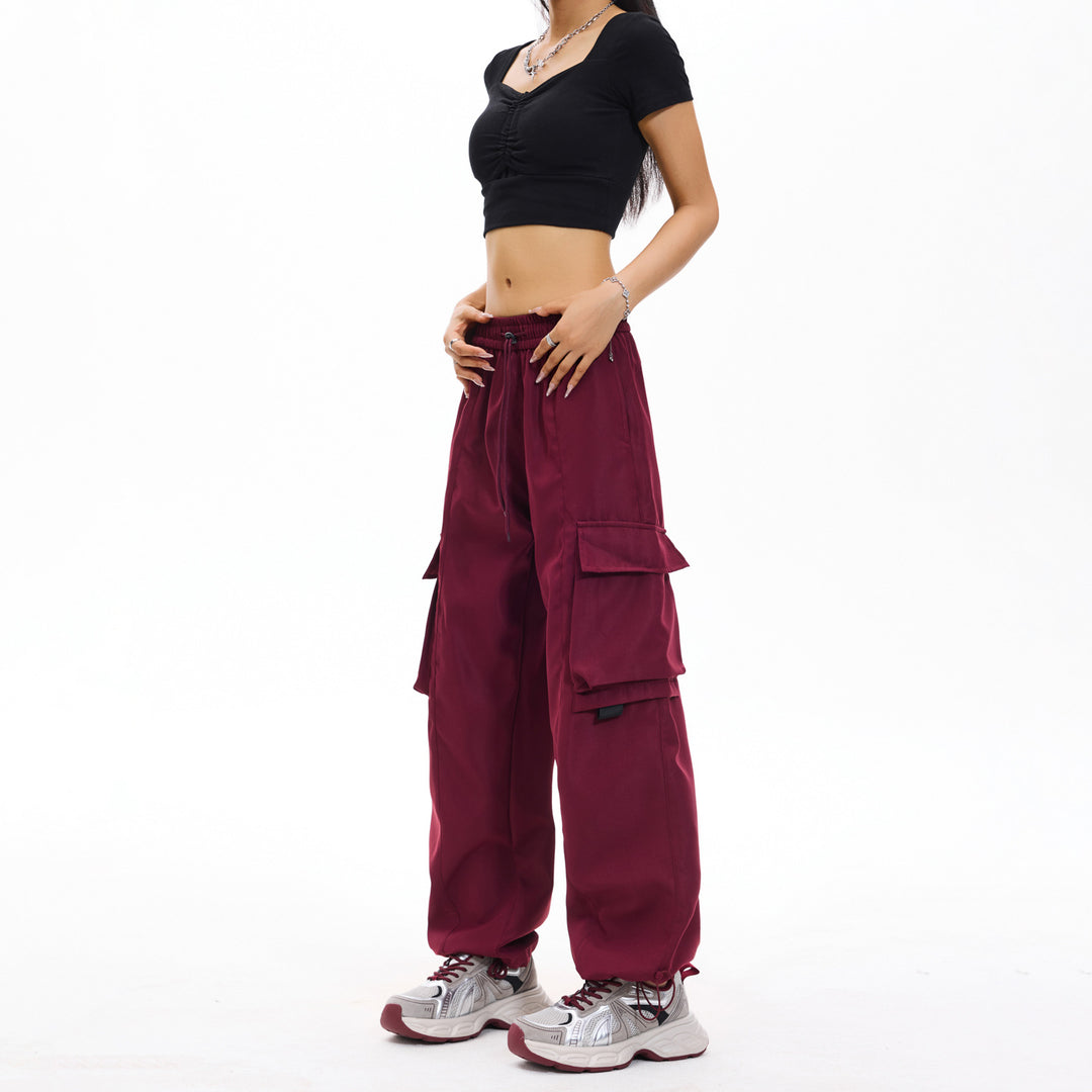 Men's wide utility cargo pants in baggy cut with drawstring waistband, large flap pockets, and adjustable leg hems Drune