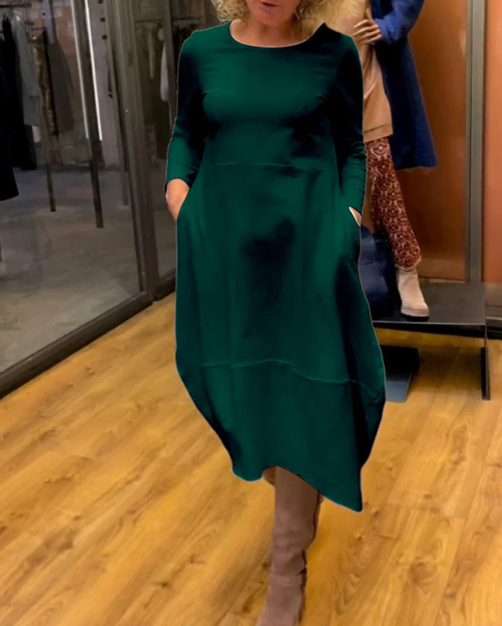 Women's asymmetrical balloon dress with three-quarter sleeves, side pockets, and flowing pointed hem Mune Fashion