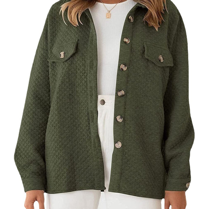 Women's quilted transitional shirt jacket with oversized cut, chest patches, and button placket Mune Fashion