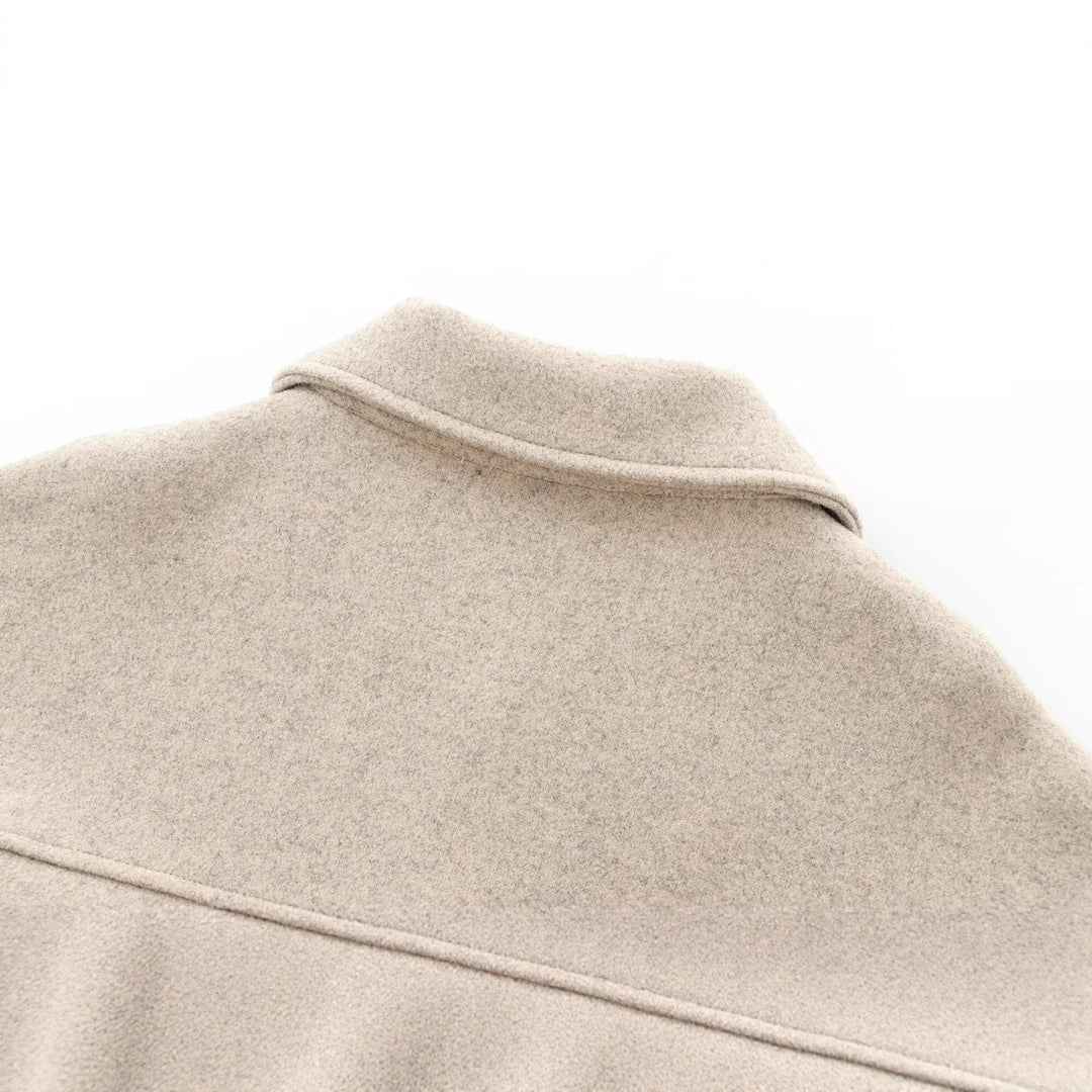 Ladies short-cut wool blend boxy jacket with dropped shoulders and flap pockets Mune Fashion