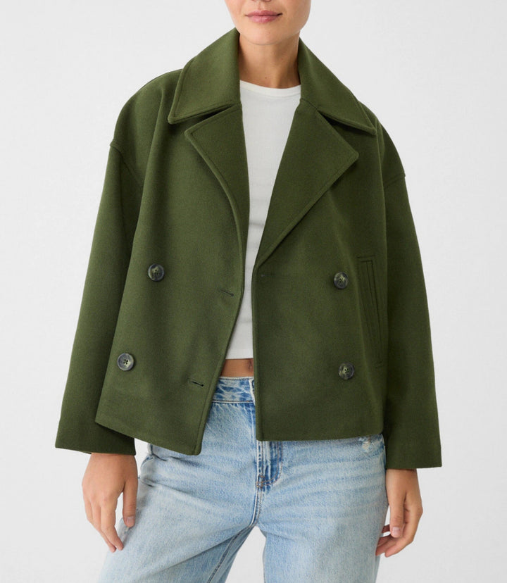 Women’s short cut double-breasted wool blend peacoat with wide lapels and boxy silhouette Mune Fashion