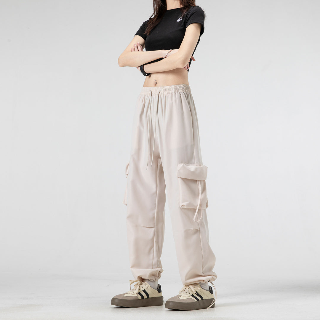 Unisex Wide Cargo Pants in Baggy Cut with Drawstring Waistband, Multiple Flaps, and Adjustable Leg Closures Drune