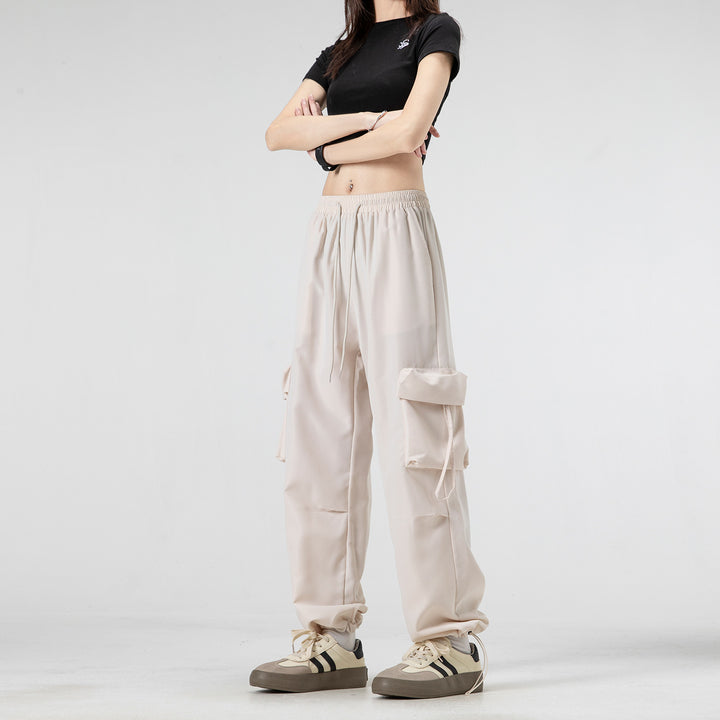 Unisex Wide Cargo Pants in Baggy Cut with Drawstring Waistband, Multiple Flaps, and Adjustable Leg Closures Drune