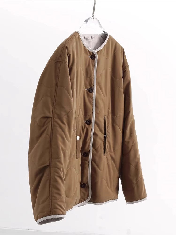 Women's quilted jacket without collar with oversized silhouette and contrast piping Mune Fashion