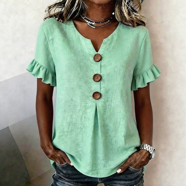 Women's top with ruffled hems and button details Mune Fashion