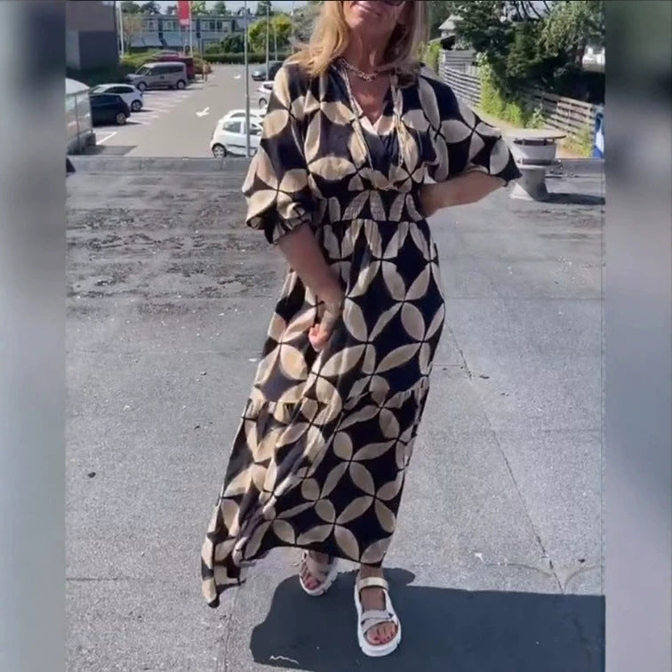 Women's maxi dress with geometric all-over print, smocked waist and ruffled tiers Mune Fashion