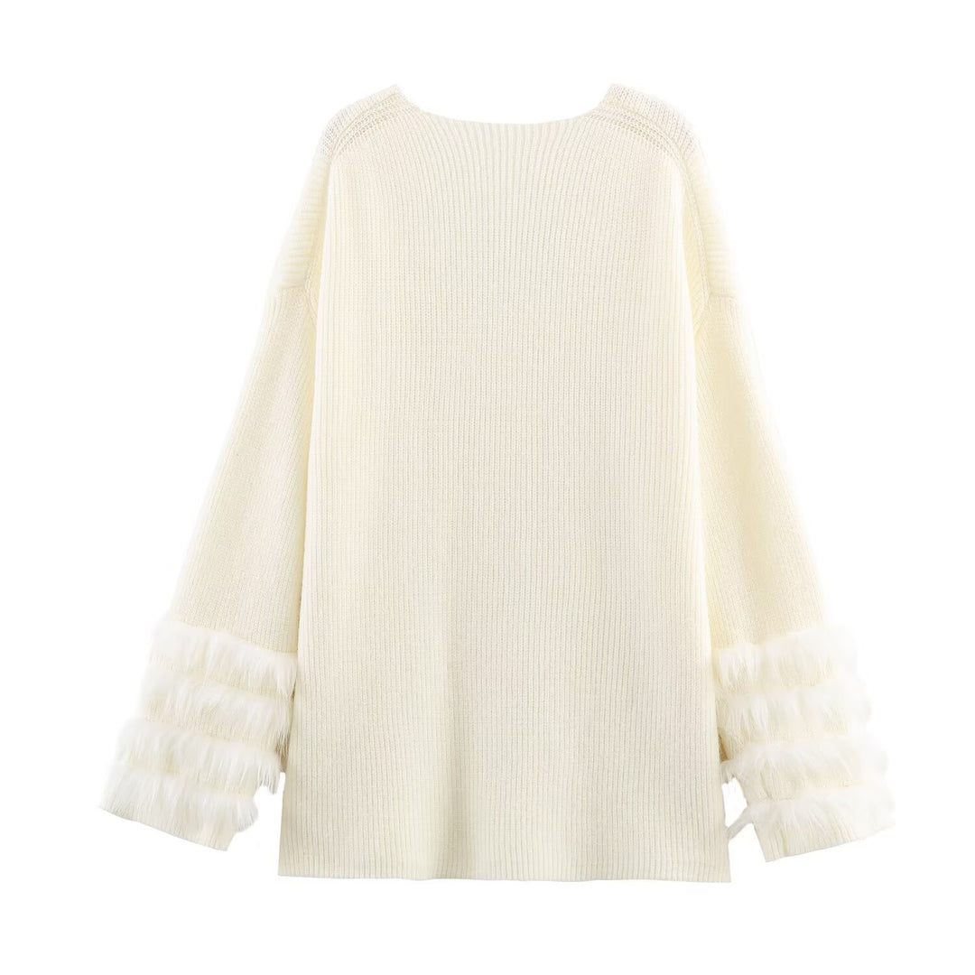 Ladies fine knit mini dress with deep V-neckline and layered faux fur sleeves Mune Fashion