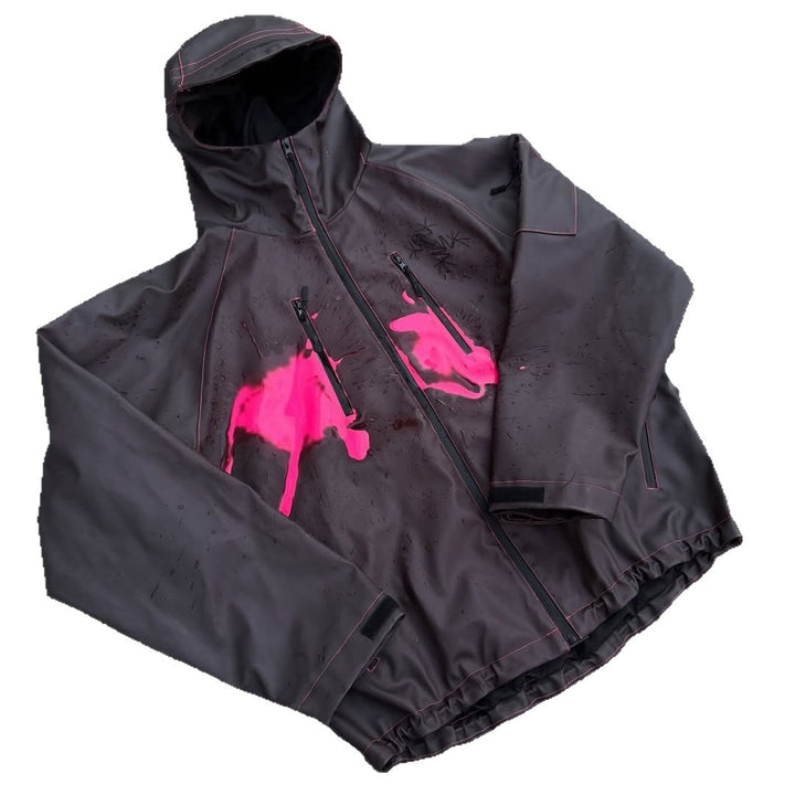 Unisex nan technical rain jacket with welded seams, slanted chest zip pockets, and adjustable drawstring hem Mune Fashion