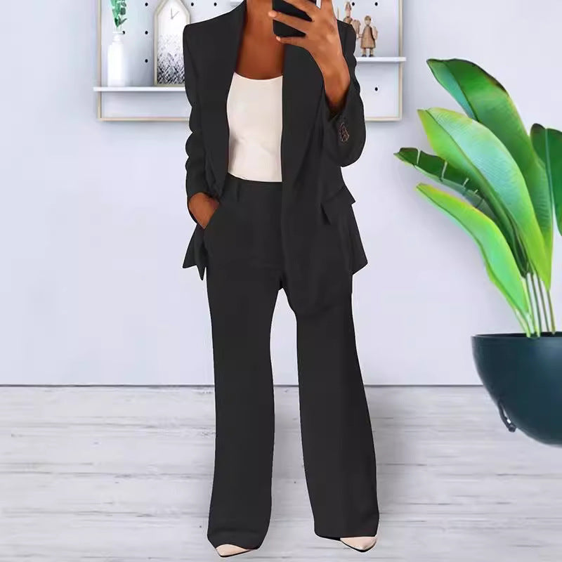 Women’s office-appropriate pantsuit set with wide trousers and tailored blazer Mune Fashion