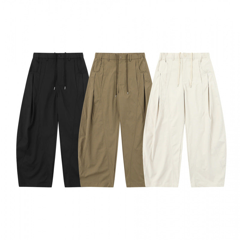 Women's wide balloon pants with drawstring waistband, pleats, and patch side pockets Mune Fashion