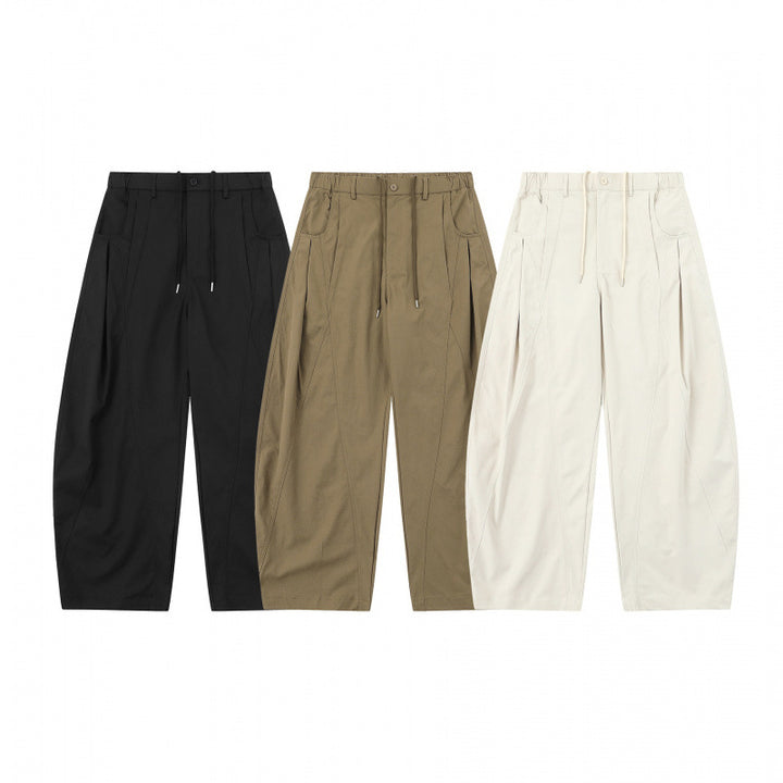 Women's wide balloon pants with drawstring waistband, pleats, and patch side pockets Mune Fashion