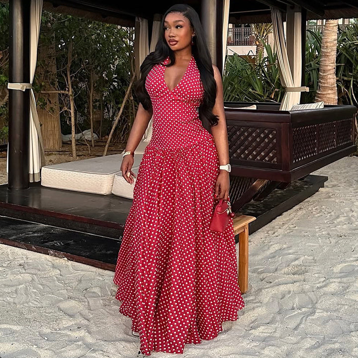 Ladies long halter dress with deep V-neck, tailored empire seam and flared layered skirt Mune Fashion