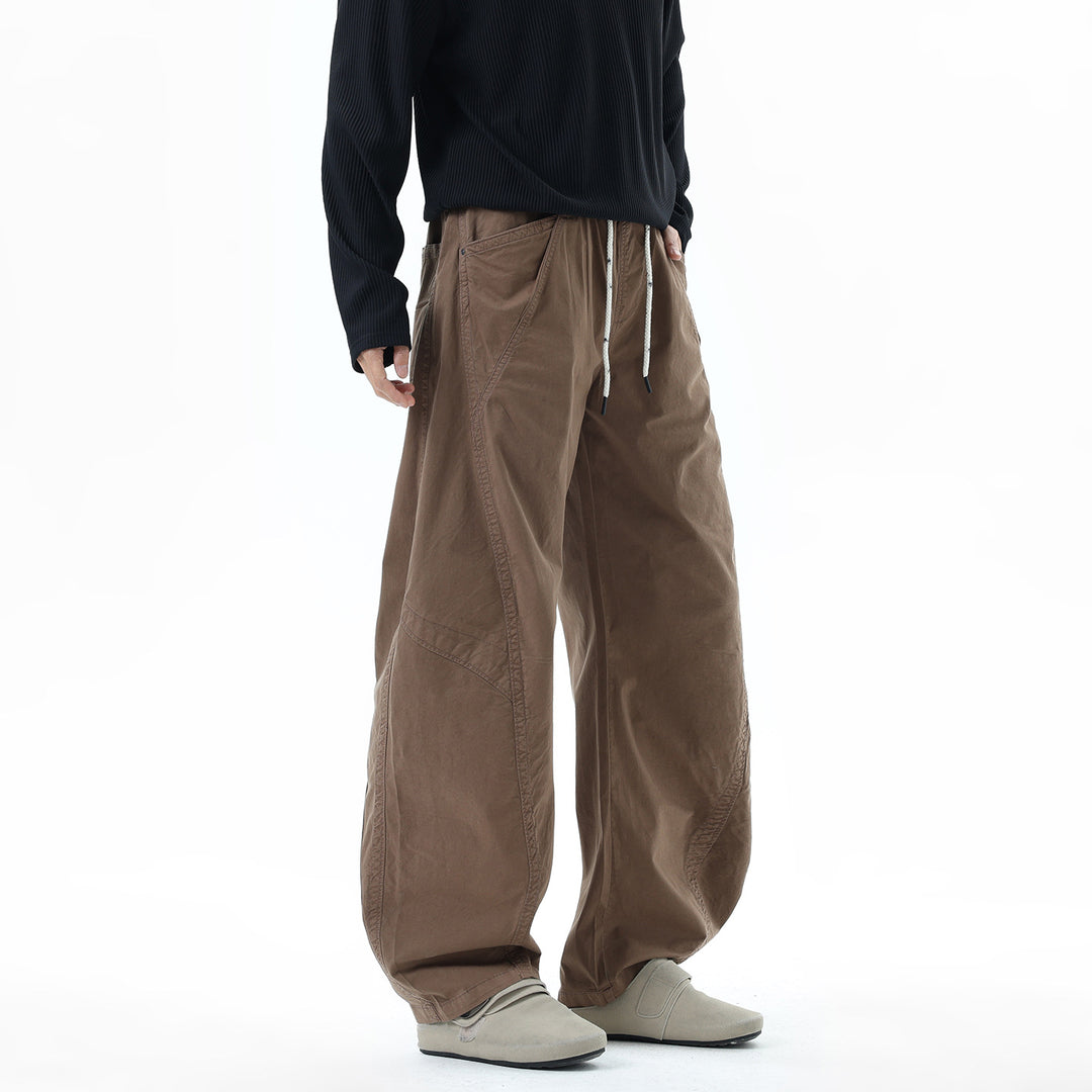Men's Light Relaxed-Fit Trousers with Drawstring, Slanted Side Pockets and Panel Seams Mune Fashion