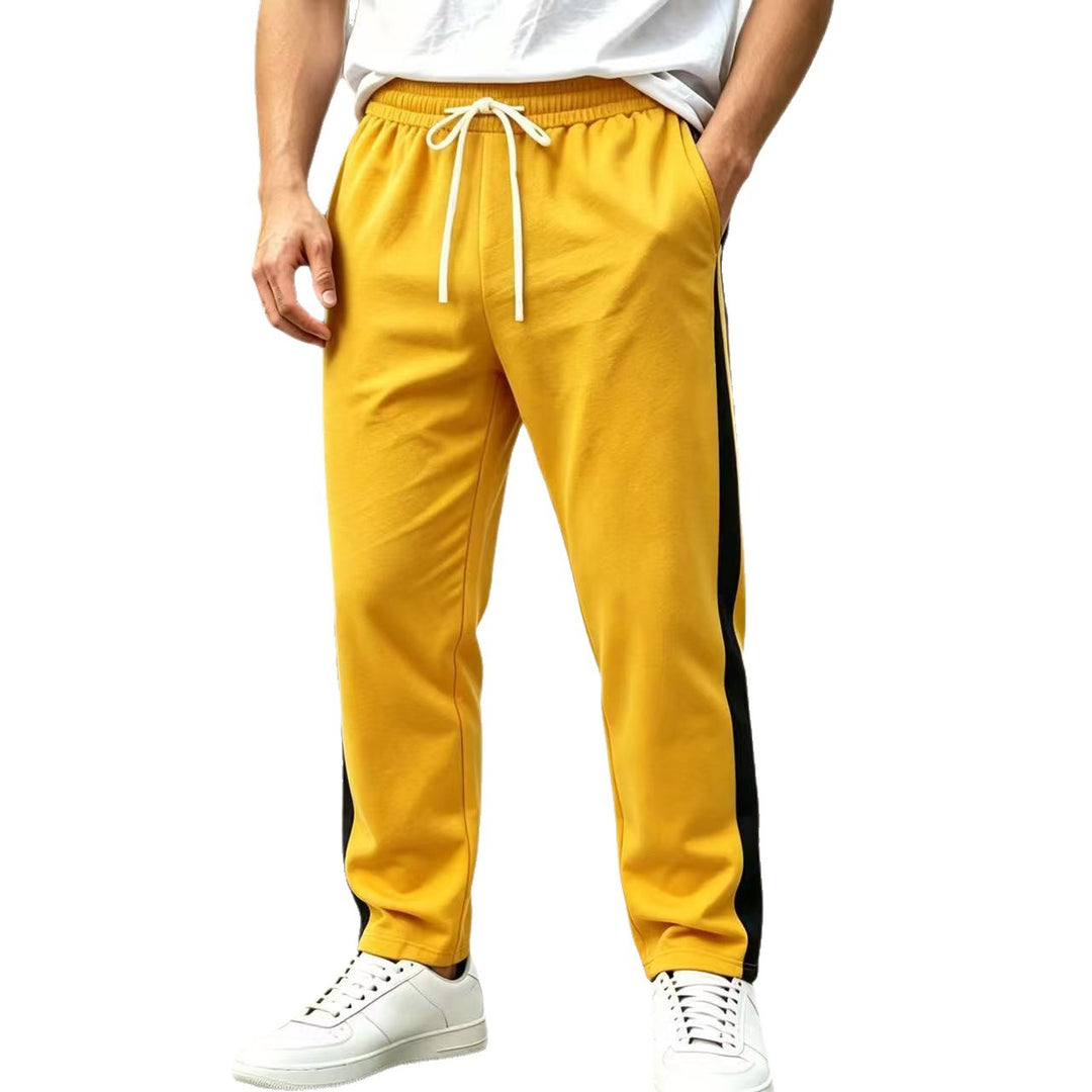 Men's jogging pants with side contrast stripe, elastic waistband and drawstring Mune Fashion