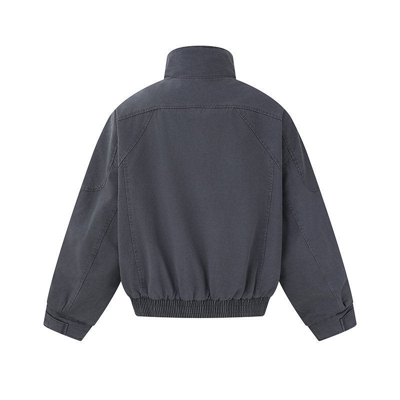 Men's short-cut canvas bomber jacket with high stand-up collar, concealed front placket, and zip pockets Mune Fashion