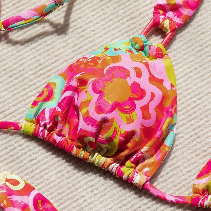 Women's triangle bikini with playful floral design and adjustable straps Mune Fashion