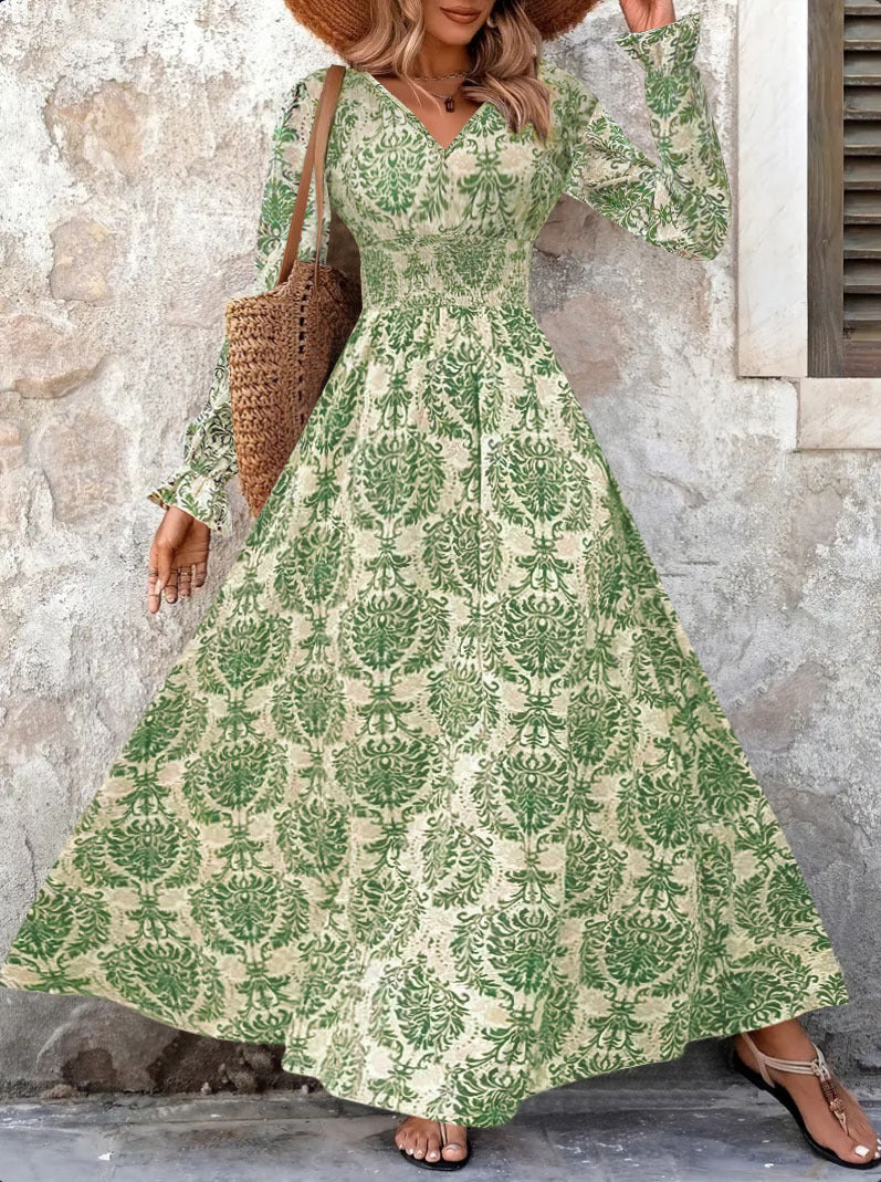 Ladies Flowing Maxi Dress with Gathered Smock Waist, Trumpet Sleeves, and Ornamental Print Mune Fashion