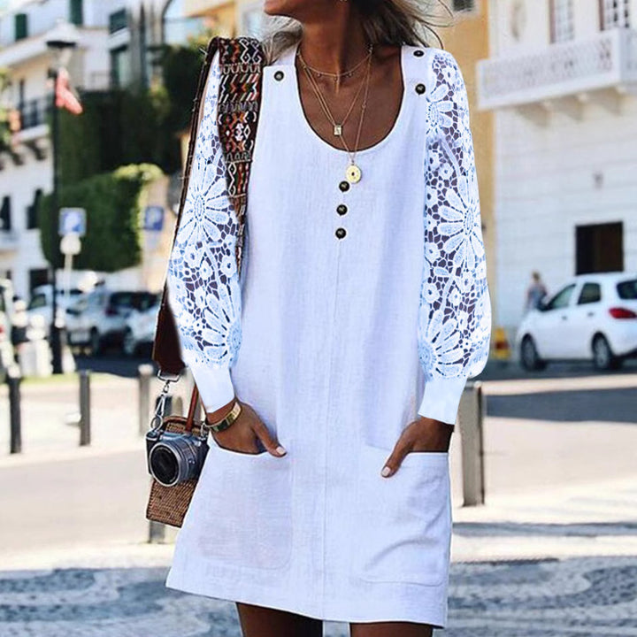 Women's relaxed linen mini dress with floral crochet sleeves, U-neckline and patch pockets Mune Fashion