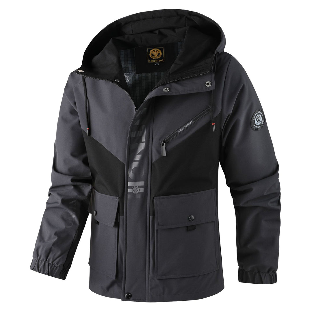 Men's functional hooded jacket in urban outdoor style with wind protection, chest zip pocket, and spacious flap pockets.